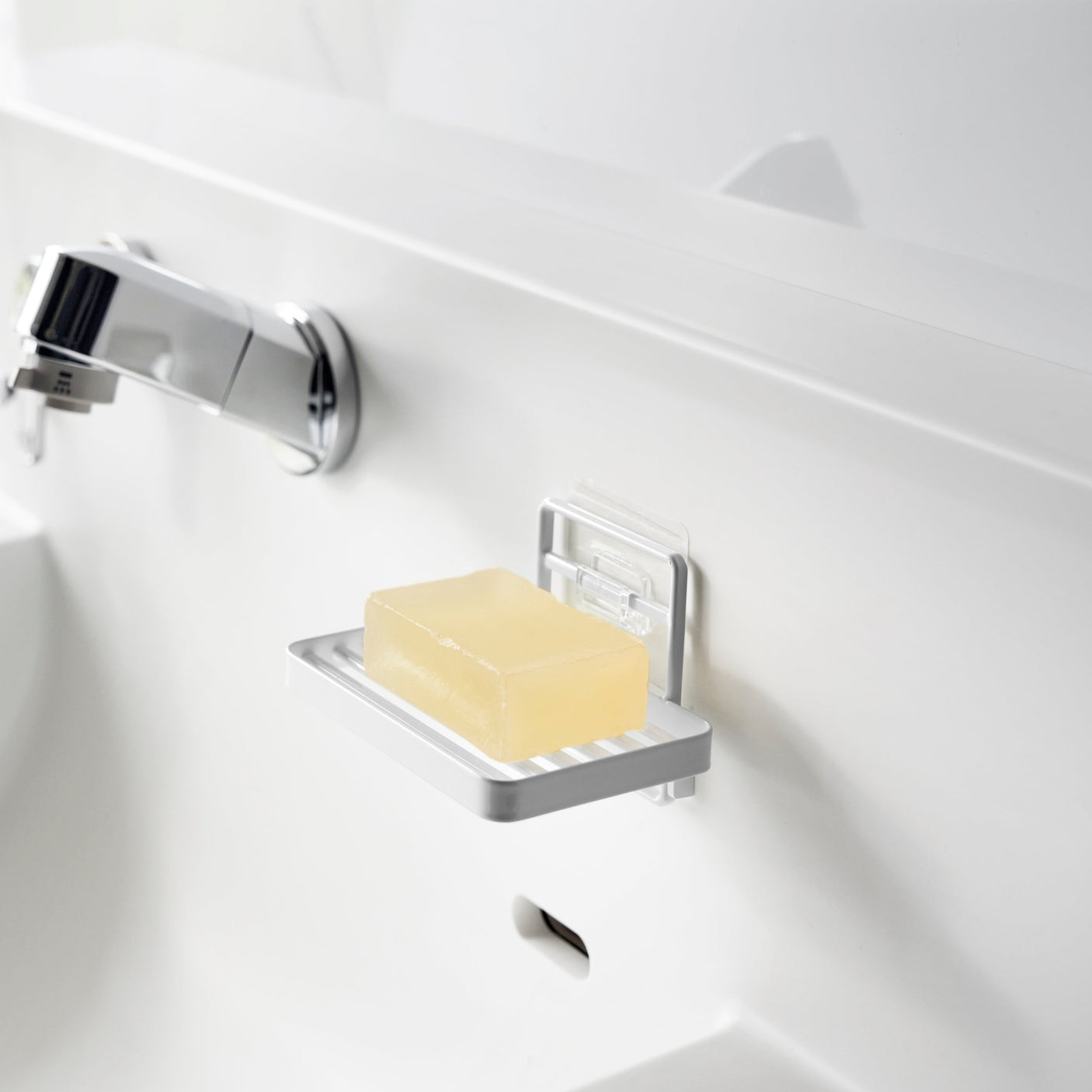 Minimalistisk såpeholder for dusj og vask.