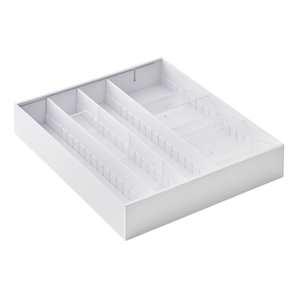 Minimalistisk og stilren bestikkholder for et organisert kjøkken.