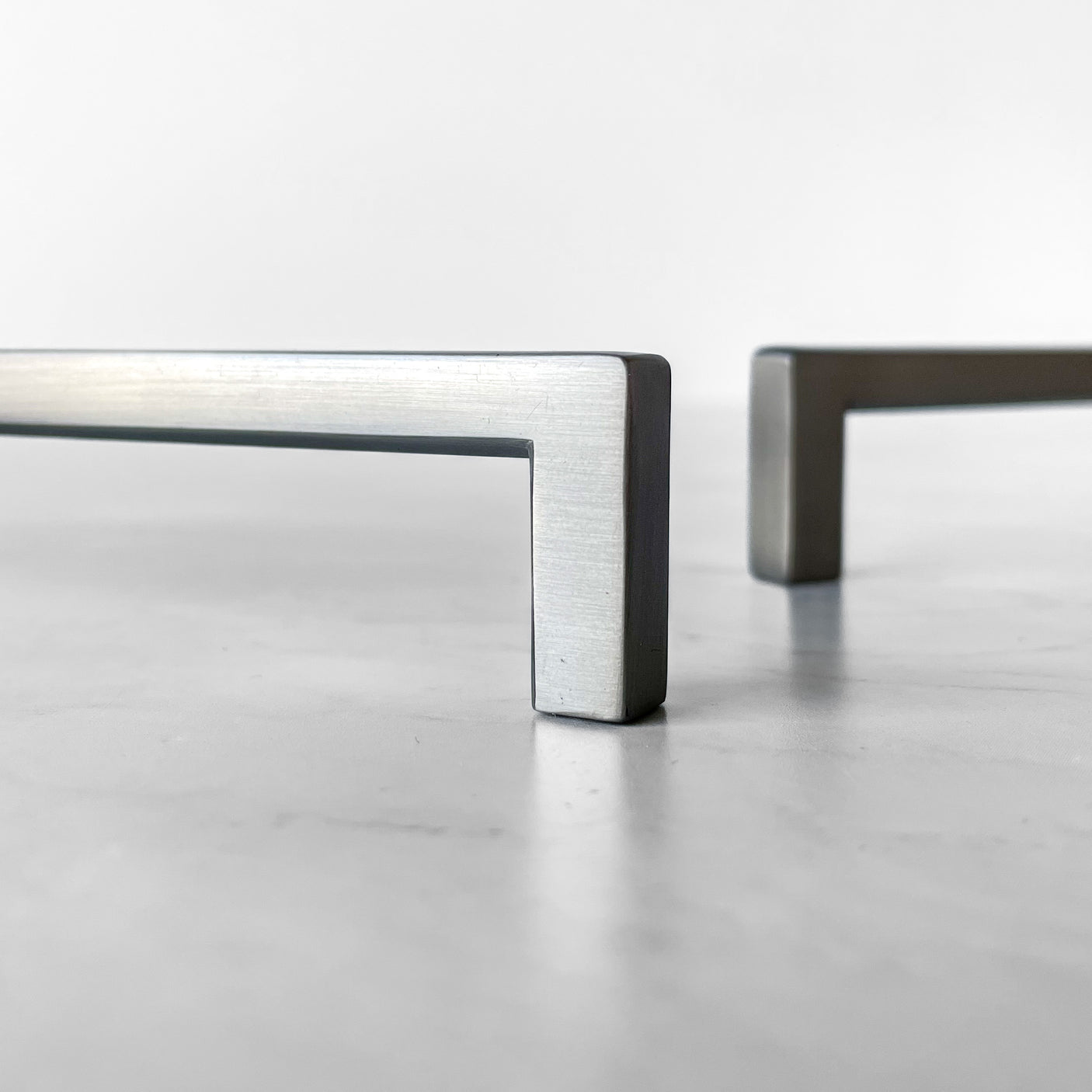 Handtag silverfärgat