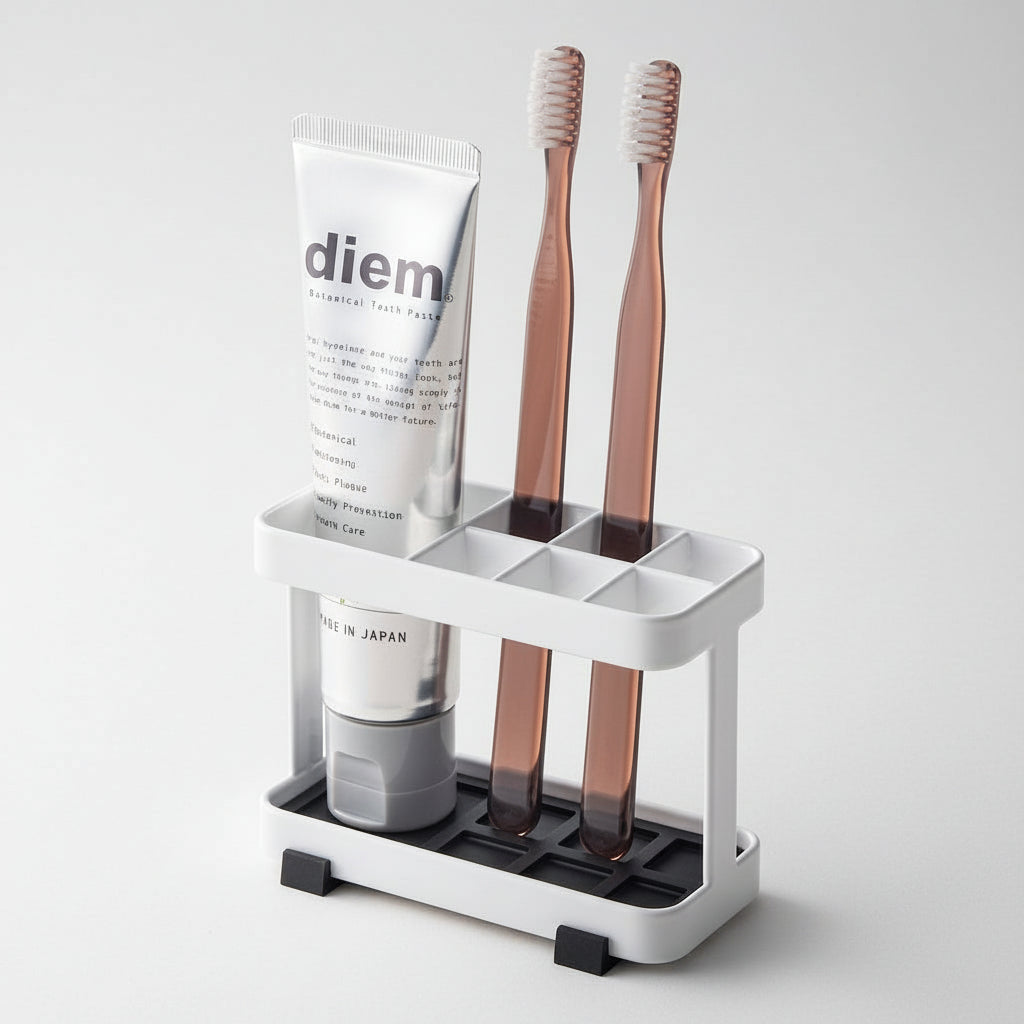 Plassbesparende tannbørstestativ i minimalistisk design.