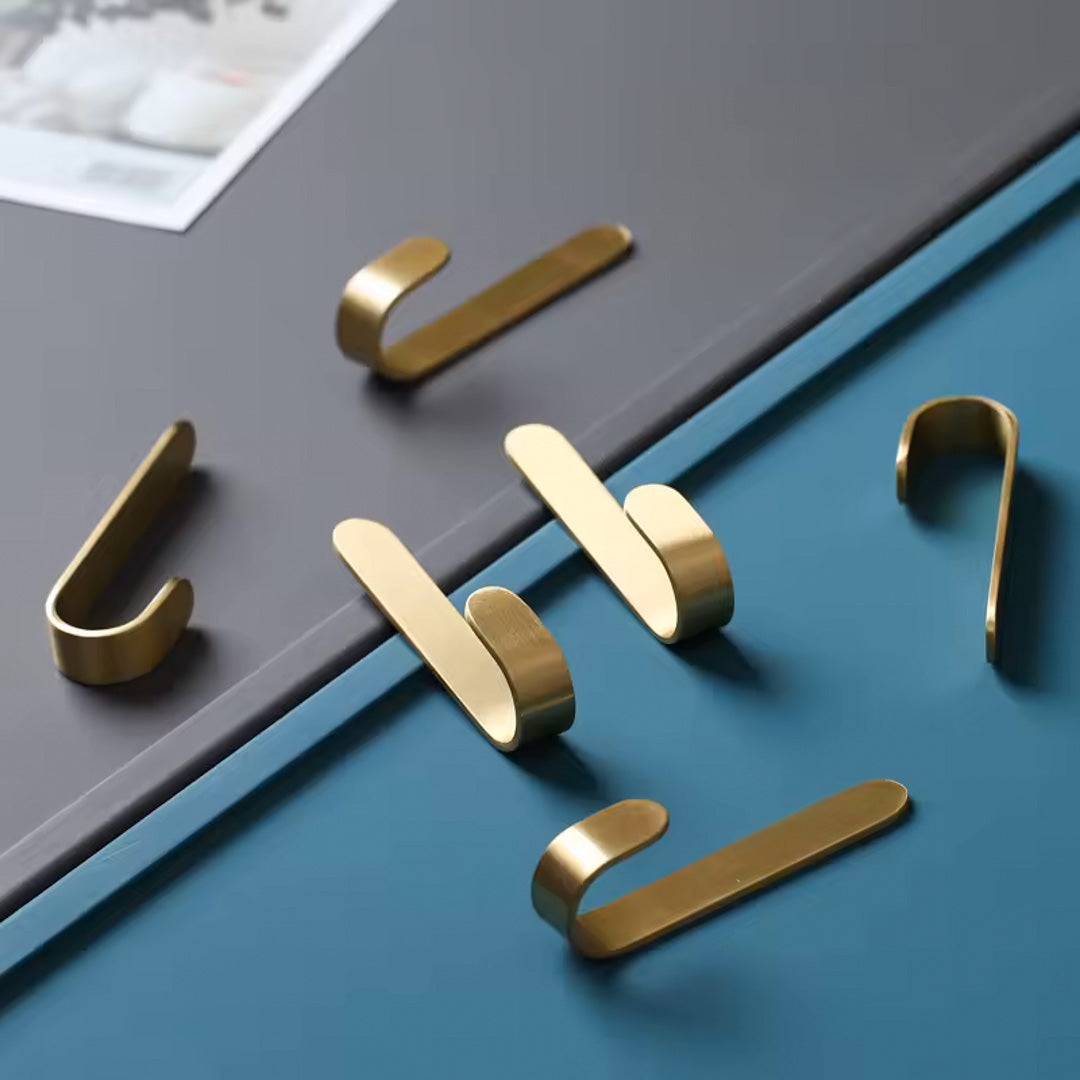 Stilfulle Ankara knagger i børstet messing – solide gullkroker til klær, håndklær og tilbehør.