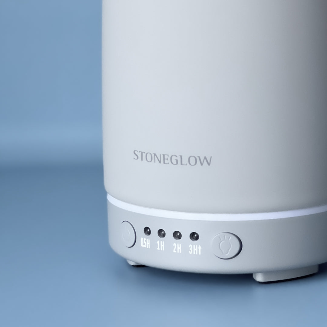 Stoneglow diffuser med minimalistisk design og tidsinnstillinger.