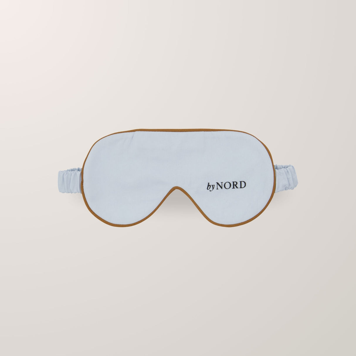 Lys blå sovemaske i myk bomull med elastisk stropp.