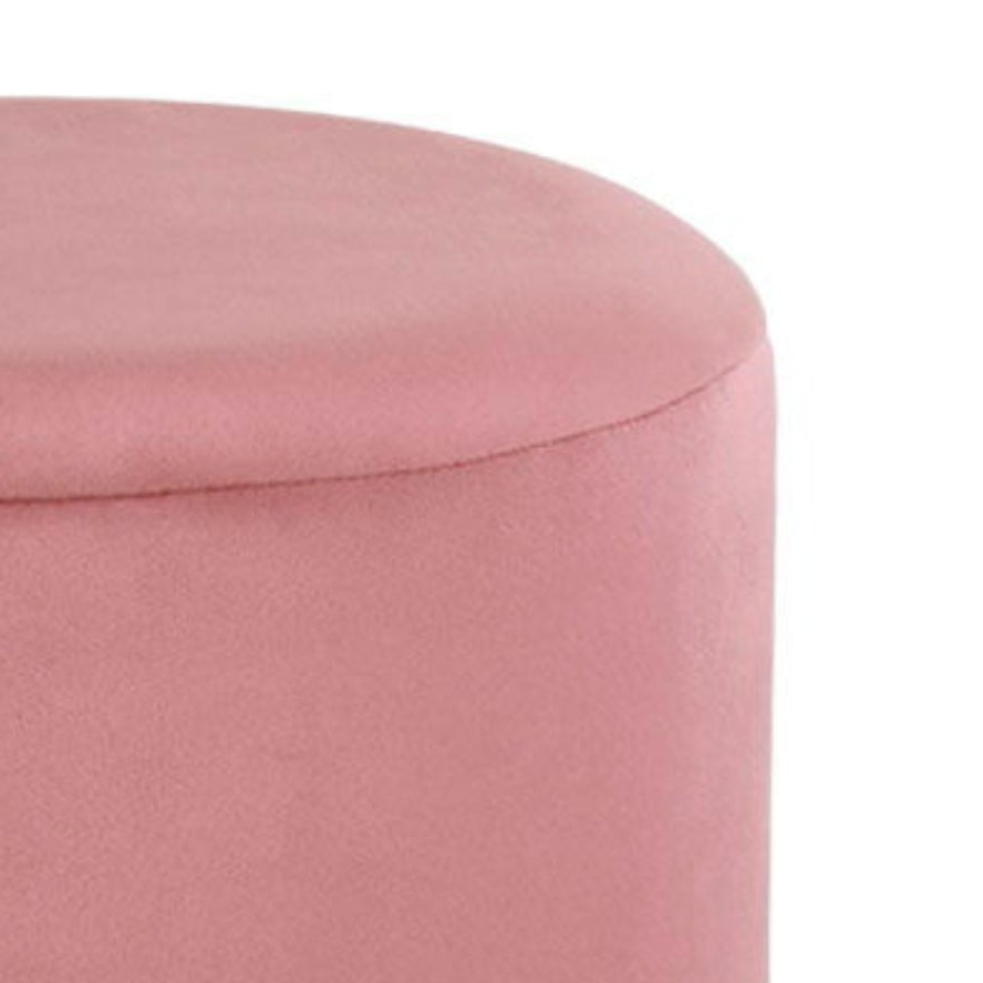 Rund rosa puff i velour med dekorativ gullfarget metallbase