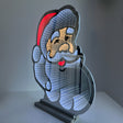Infinity speil julepynt med Nisse ansikt og LED-lys i 3D-effekt.