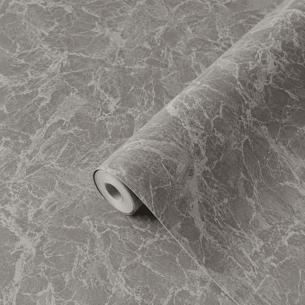 Limestone antrasitt kontaktplast delvis utrullet, detalj av matt mørkgrå steinstruktur