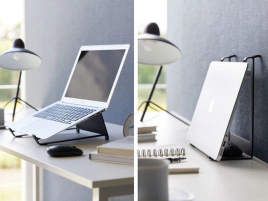 Justerbart laptopstativ sort brukt i liggende og stående posisjon for laptop og nettbrett