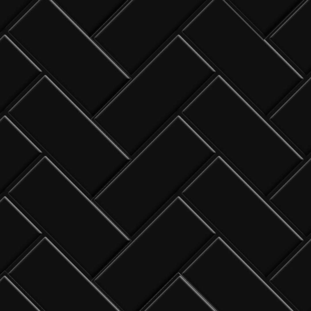 Selvklebende svarte fliser i fiskebeinsmønster – moderne og tidløse veggfliser til kjøkken og bad.