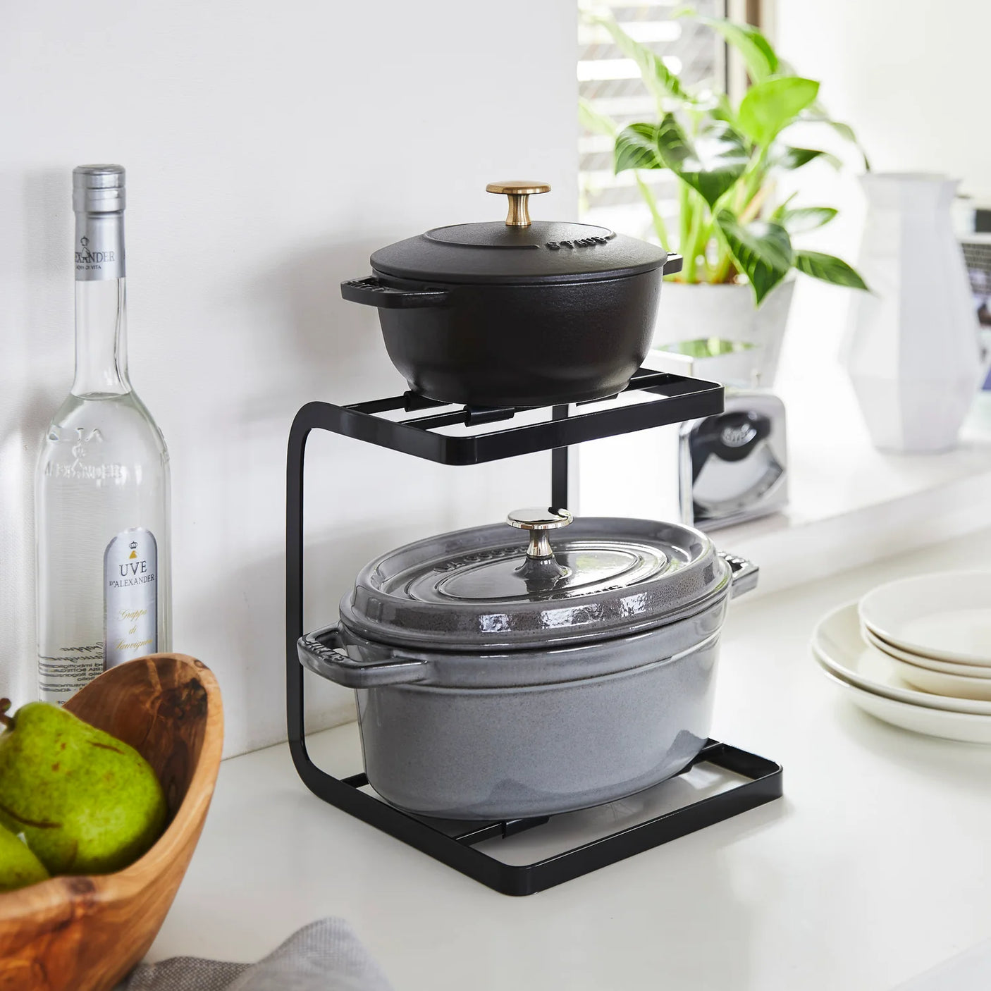 Gryteopphold i svart med silikonbeskyttelse og kroker