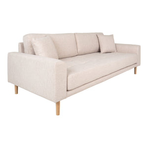 Lys lounge sofa i sand med skandinavisk preg. 