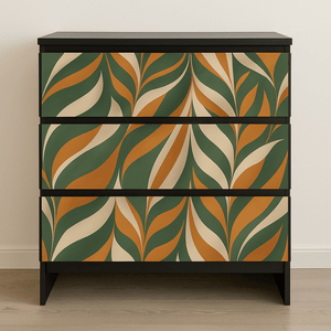 Boho leaves kontaktplast på kommode med botanisk blademønster i grønt, oransje og beige
