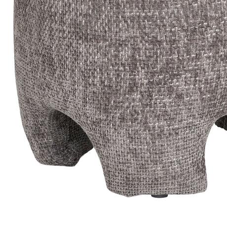 Grå puff med avrundet form og dekorativt design