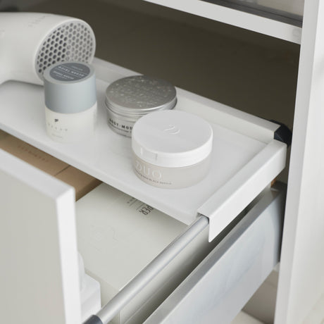 Detaljebilde av ekstra hylleplate til høy skuff