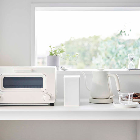 boks til kaffestasjon med filter og kapsler