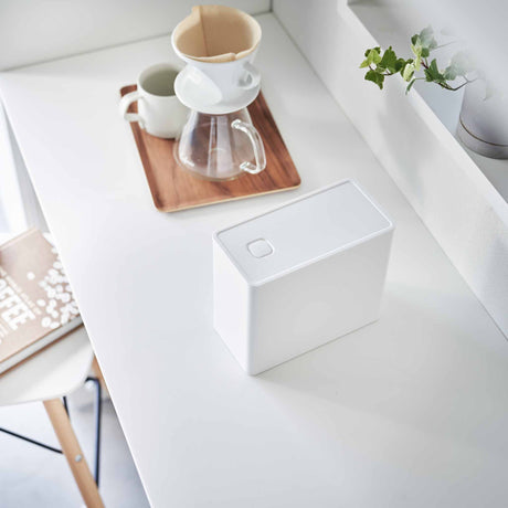 Funksjonell oppbevaringsboks til kaffe, te eller sukker med enkel dosering.