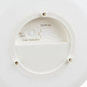 Underside av Derry lampe med bryter og ladeinngang