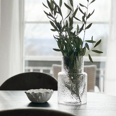 Kunstig grønn kvist med olivenblader til styling i hjemmet