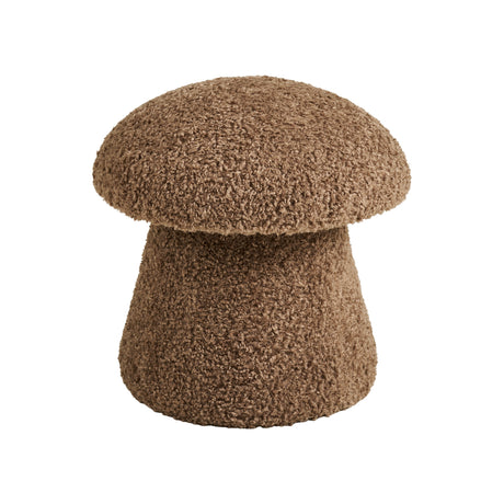 Detaljbilde av myk fuskepelstekstur på Enna puff