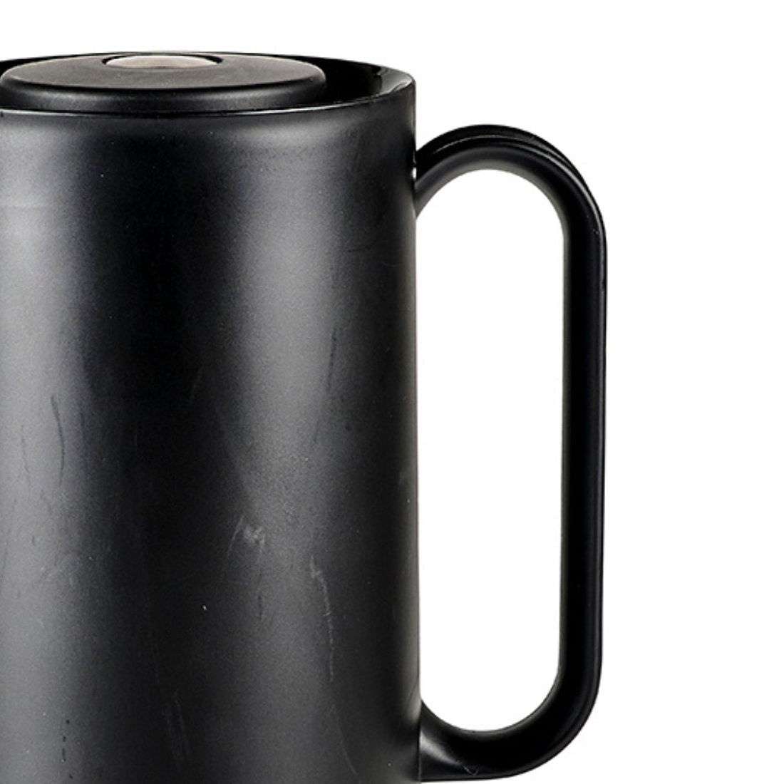 detaljbilde av lokk med trykknapp funksjon