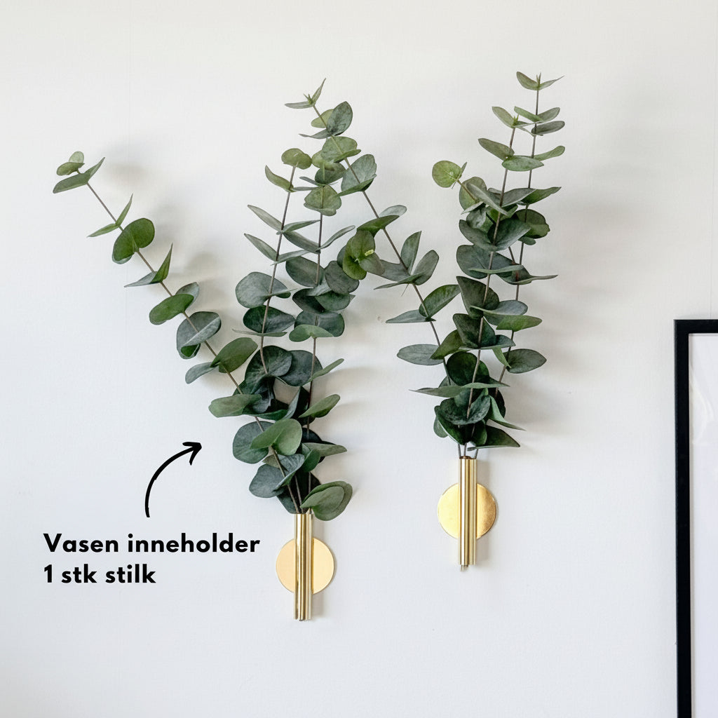 Realistisk kunstig plante med grønne blader på stuebord