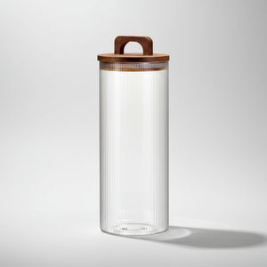 Oppbevaringskrukke i rillet glass med lokk i naturlig tre