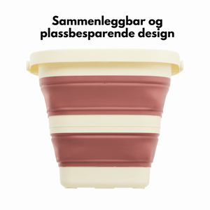 Sammenleggbar bøtte i gammelrosa som presses flat etter bruk
