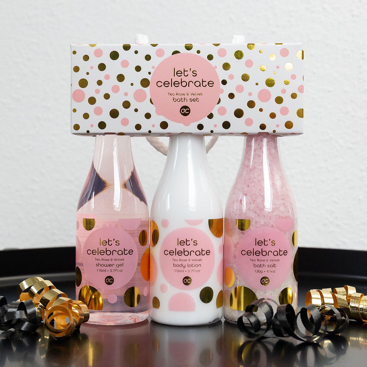 Välbefinnande set med tre rosa flaskor och gåvaförpackning