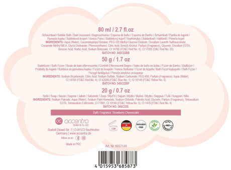 Bakside av rosa gavesett formet som en prinsessevogn, med produktinformasjon, ingrediensliste og strekkode.