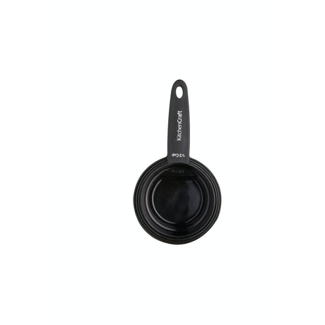 Sorte KitchenCraft-målebeger stablet inde i hinanden, set ovenfra på hvid baggrund.