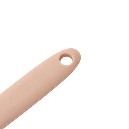 Nærbilde av rosa silikonhåndtak med praktisk hull for oppheng av slikkepotten.
