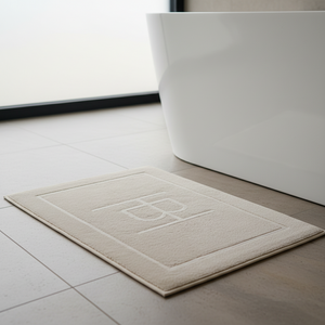 Myk badematte i beige til servant og badekar