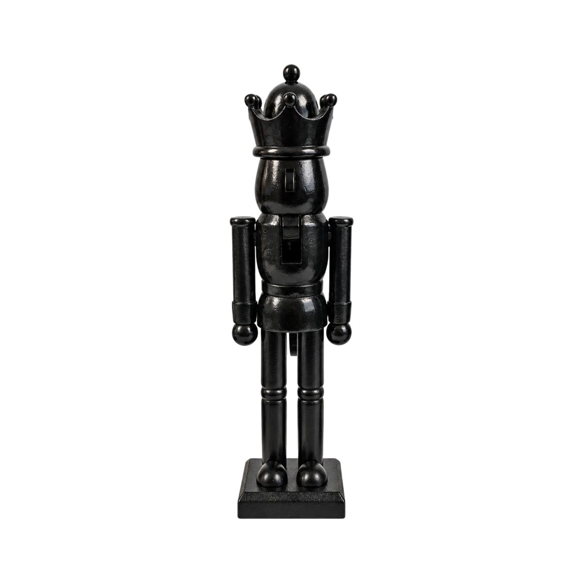 Dekorativ nøtteknekker i blank svart med krone, lange ben og firkantet sokkel, 25,5 cm høy.