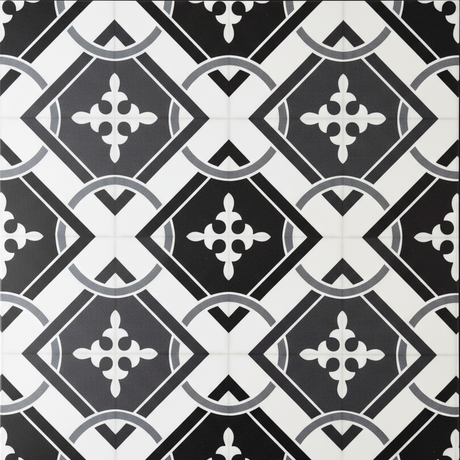 Nærbilde av Isadora flis med grafisk ornament i sort og gråtoner