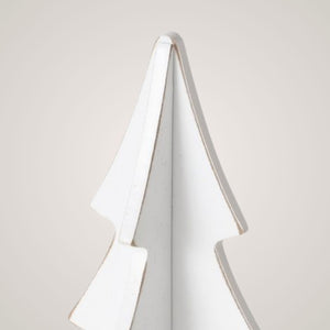 Nærbilde av toppen på hvitt trebordtre med enkel, minimalistisk design.